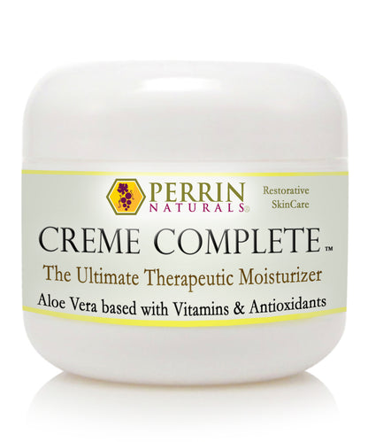 A white jar of Perrin Naturals Creme Complete with a yellow label that reads &