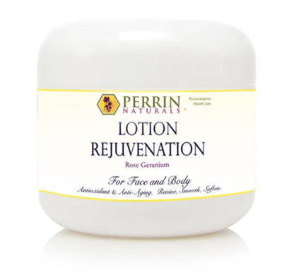 A white jar of Perrin Naturals Lotion Rejuvenation with a yellow label, indicating it is for face and body use, and that it contains rose geranium oil.