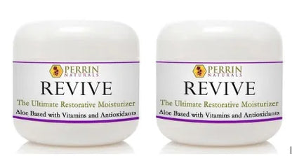 Two white jars of Perrin Naturals Revive Ultimate Resistant Moisturizer, with vitamins and antioxidants, 60g each.